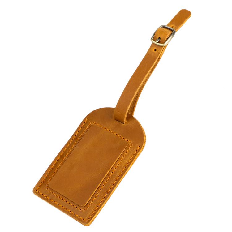 Tan genuine leather luggage tag with card pocket and buckled hanging strap, stitched border