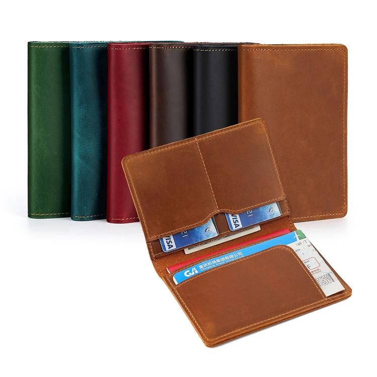 Assorted color genuine leather passport card holders; one open with cards inside.