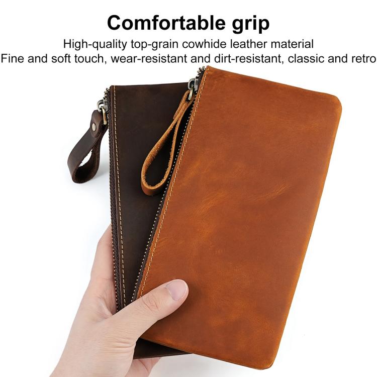 Vintage leather phone wallet clutch, brown, zip closure, wrist strap, hand-held view