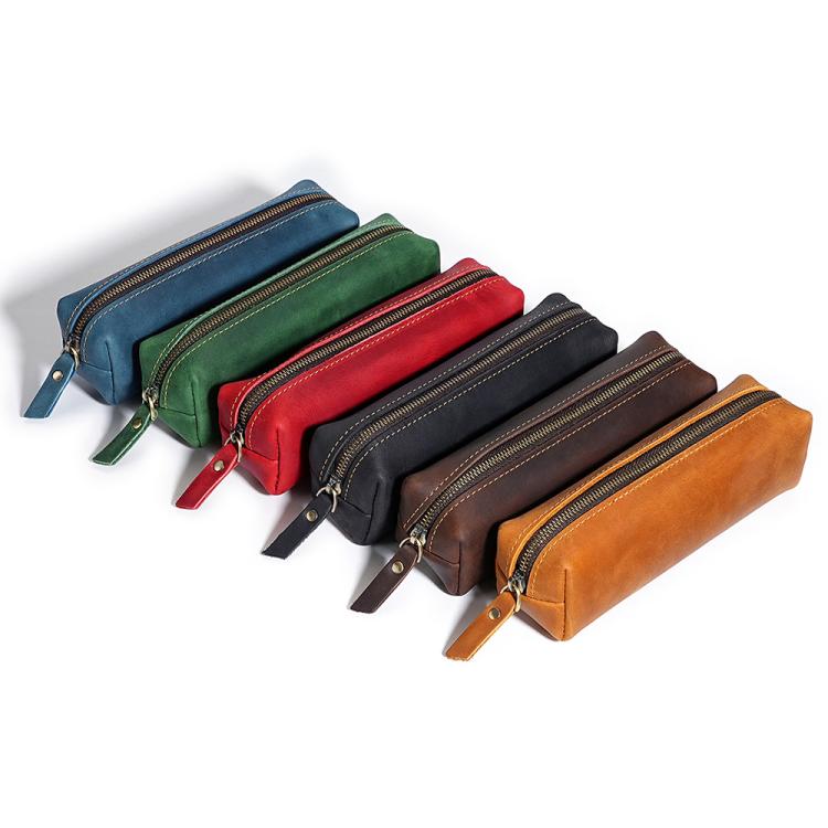 Set of leather pencil cases in blue, green, red, black, and brown with zippers