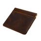 Dark brown leather coin purse with top zipper and contrast orange stitch trim