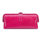 Rose red leather toiletry bag with top zipper, loop handle, and side tassel pulls