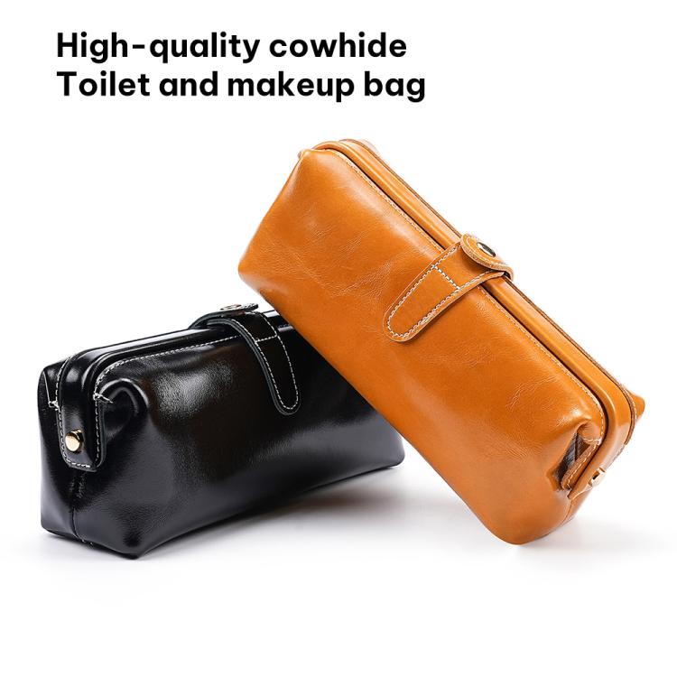 Black and orange leather toiletry bags with top zippers and loop handles
