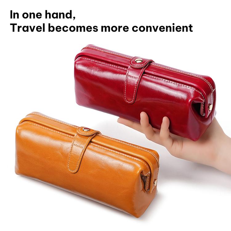 Oil-waxed leather toiletry bags: red and tan/orange, each with carry handle