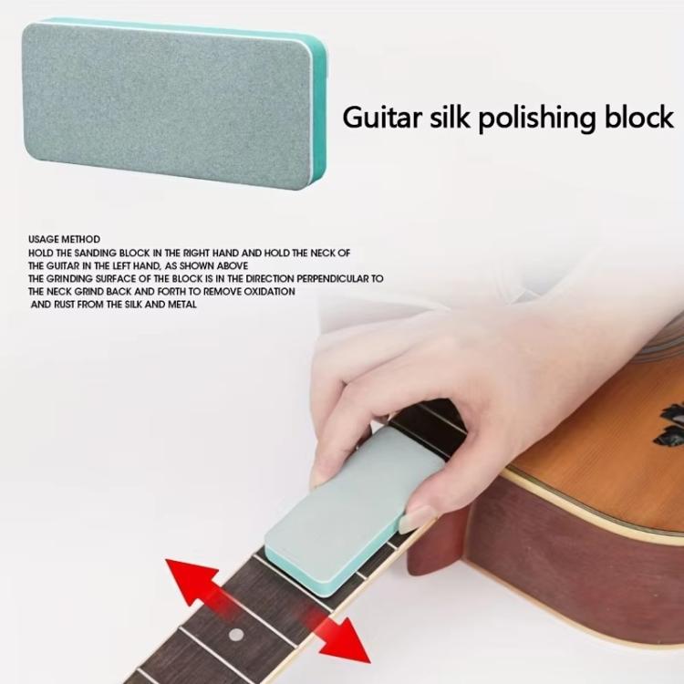 Double-sided polishing block with gray abrasive pad and teal edge, in hand for guitar