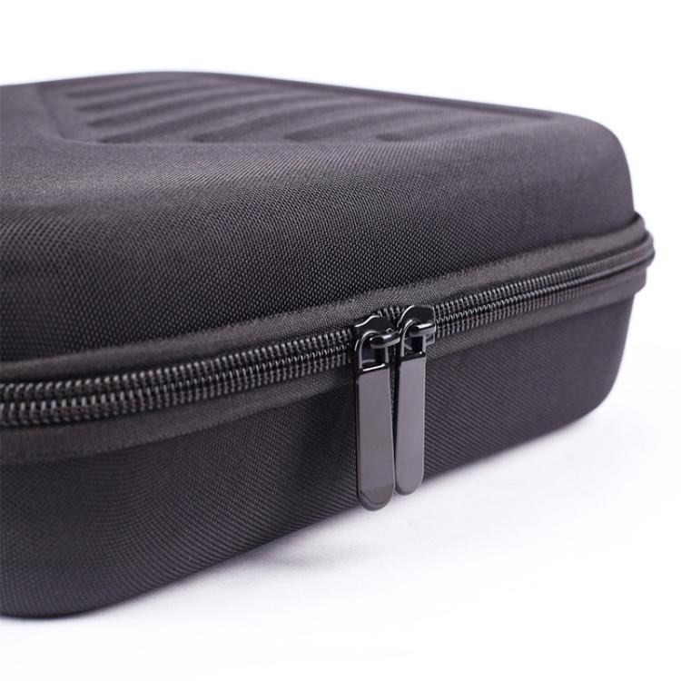 Zipper detail on dark kalimba bag with metal pull and protective fabric edging