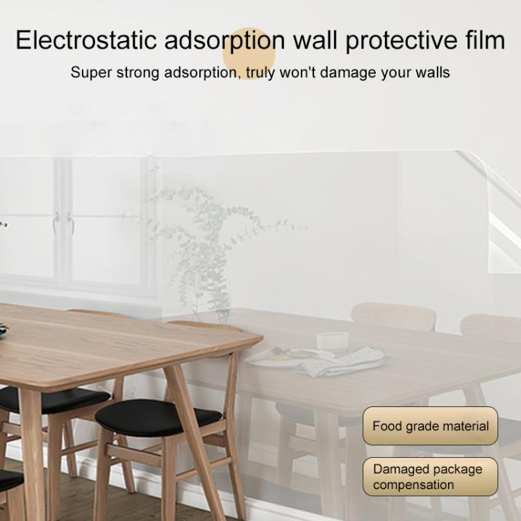 Transparent electrostatic wall protective film sheet stretched over furniture on the wall