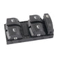 Power window switch panel with four window buttons and lock icon, black plastic