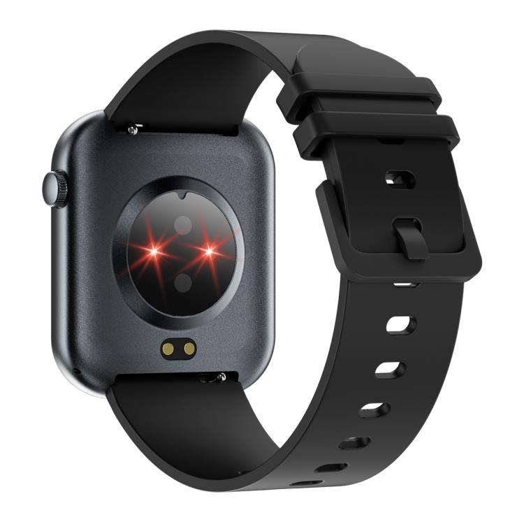 Back of a black smartwatch showing its round health sensor and charging contacts