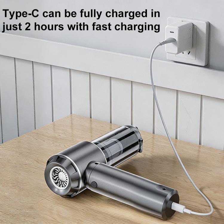 Cordless handheld vacuum cleaner with long dust bin, charging Type-C cable and plug visible