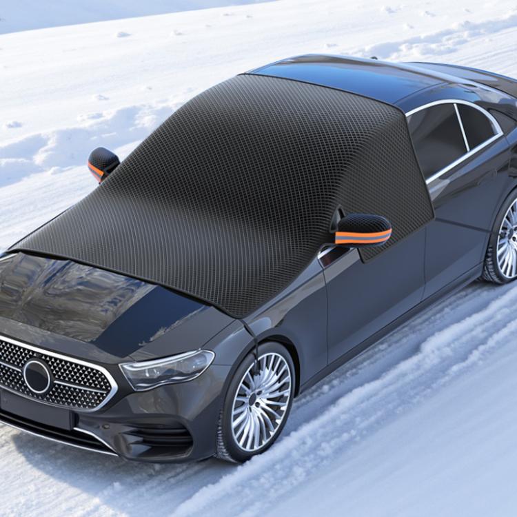 Black windshield snow cover on car with orange-trimmed magnetic side tabs