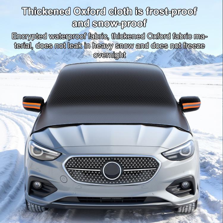 Front windshield snow cover with orange-trim ear caps on a car, black fabric