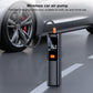 Black wireless tire inflator with digital readout, positioned near a car wheel