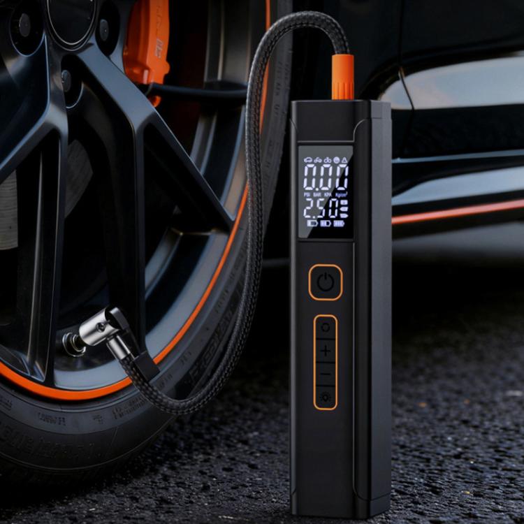 Black dual-screen electric car air pump with orange-tipped hose connected