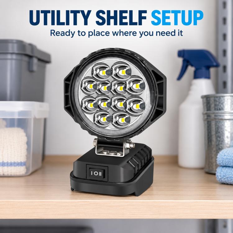 Round black LED work light on compact base with multi-LED head.