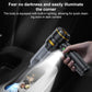 Black handheld car vacuum cleaner with LED-lit nozzle and clear dust container