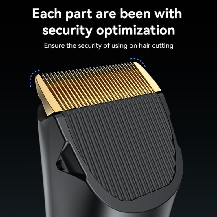 Black clipper guard with gold blade top, close-up detail of cutting head.