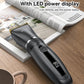Black cordless hair clipper with LED power display window and gold blade on surface.