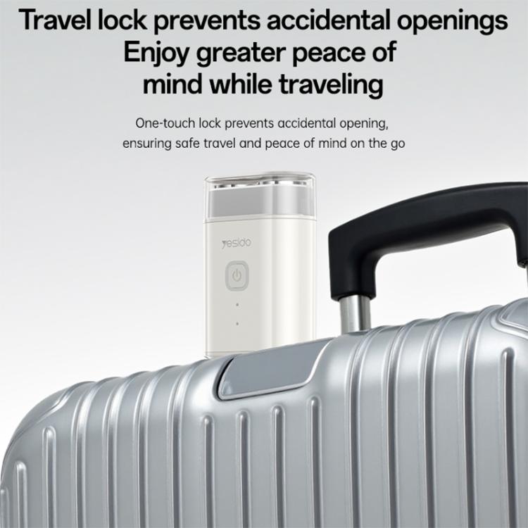 Portable electric shaver upright with travel-lock design, shown near a suitcase handle
