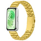 Gold textured stainless steel watch band with folding clasp, shown attached to a smartwatch