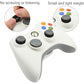 Aiming precision rings mounted on controller thumbsticks with gray and black tops