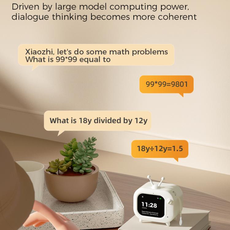 White AI robot TV toy with dual antennas on a surface, display showing 11:28