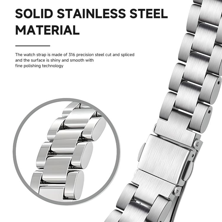 Close-up of polished stainless steel watch band links and clasp