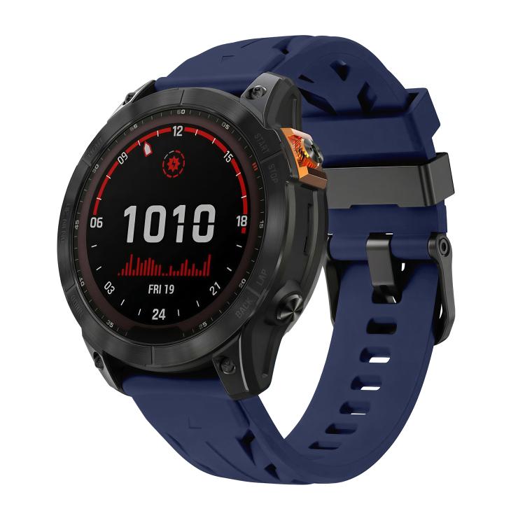 Navy blue silicone watch band with pin buckle on a black smartwatch