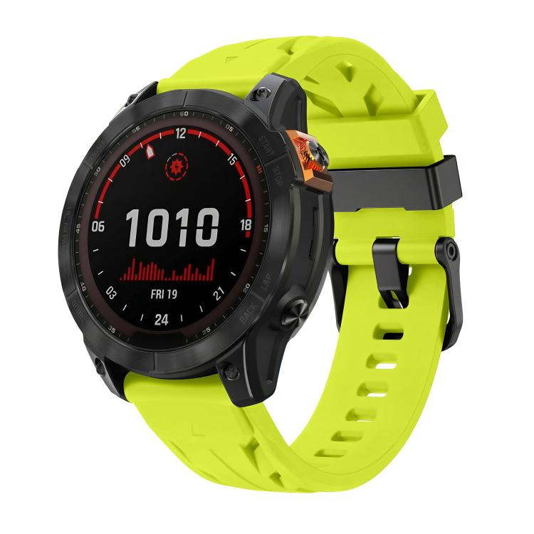 Lime silicone watch band with pin buckle, fitted to a black smartwatch