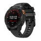 Black silicone watch band with pin buckle, shown on a Garmin watch.