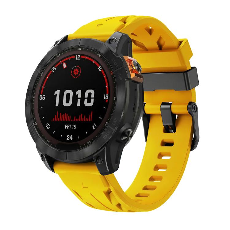 Yellow silicone watch band with black pin buckle, shown on a Garmin watch.