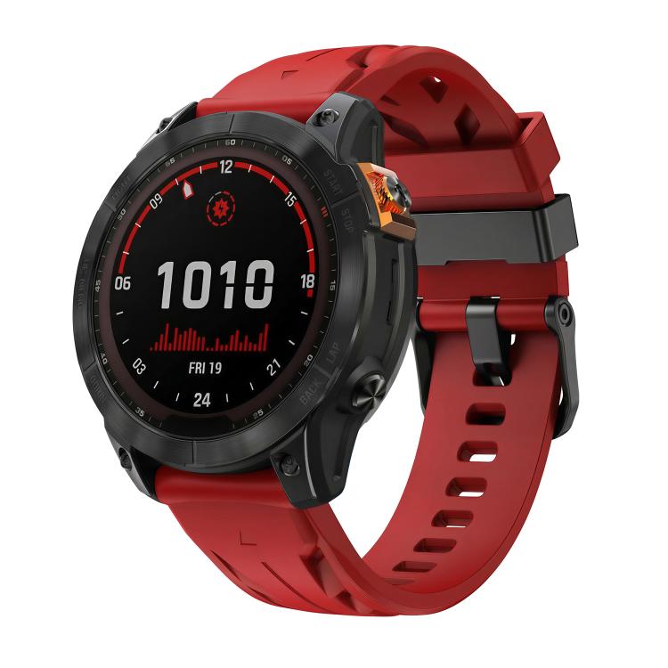 Red silicone watch band with pin buckle, fitted to a black smartwatch