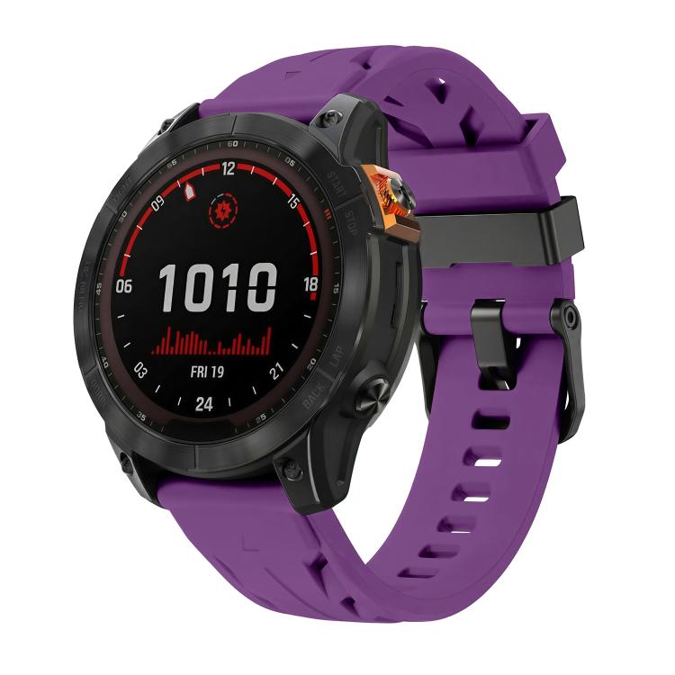 Purple silicone watch band with pin buckle, fitted to a black smartwatch