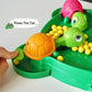 Turtle bean-eating game tray with pink and green turtle faces and yellow beads
