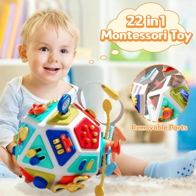 Colorful Montessori busy board cube toy with multiple interactive activity panels and knobs