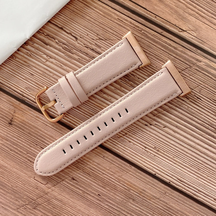 Light pink leather-look watchband with metal buckle and perforated stitching
