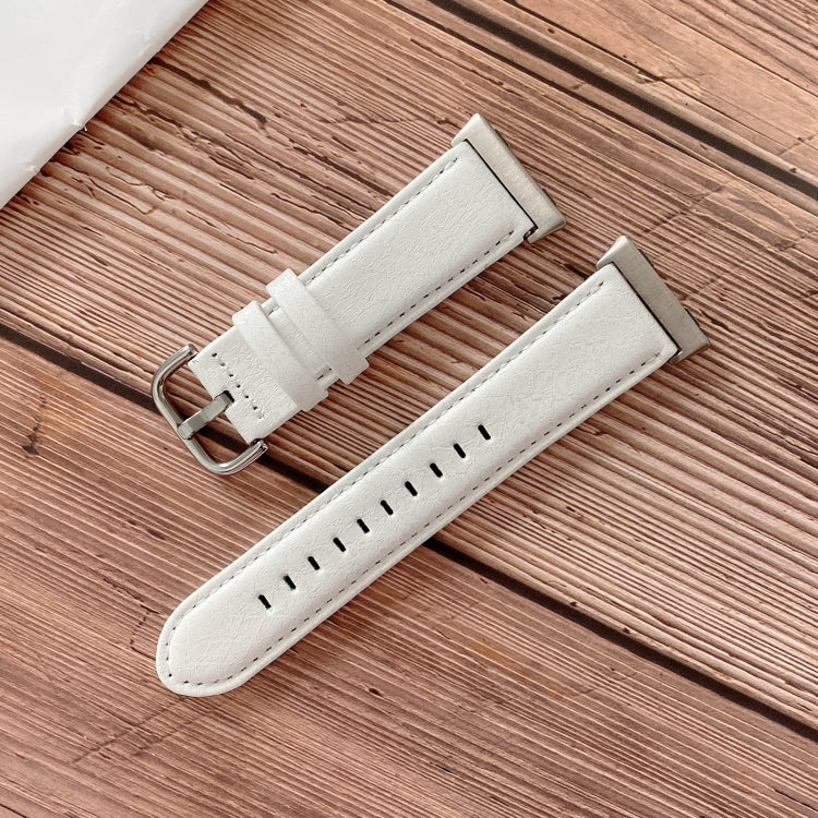 White leather-look watchband with metal buckle and perforated stitching