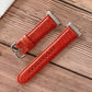 Red shell-texture watchband with metal buckle and stitched perforation