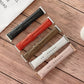 Assorted shell-texture watchbands set in black, red, brown, white, and pink
