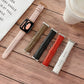 Assorted shell-texture watch straps in pink, brown, black, red, and white