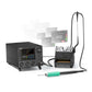 Black soldering station with integrated sleep stand, digital screen, and green-handled iron