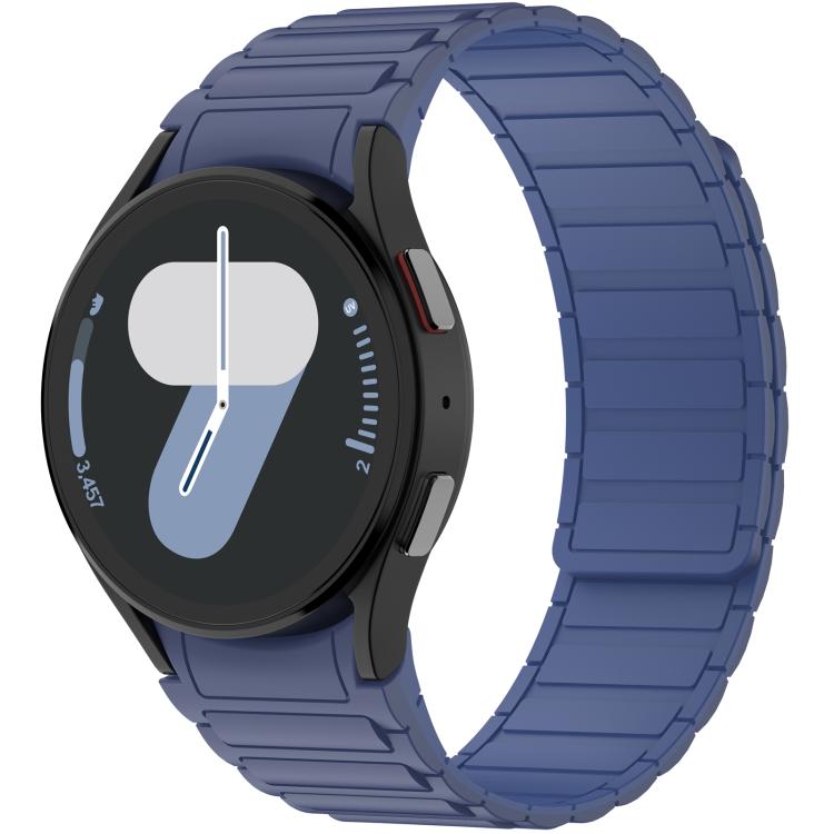 Dark navy silicone watch band with segmented links, fitted to a round smartwatch