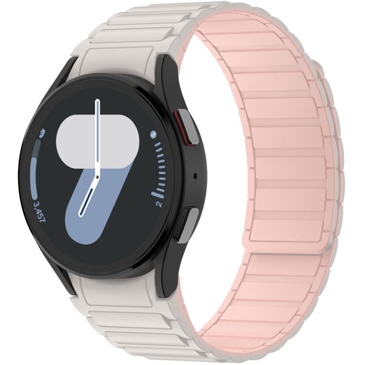 Starlight silicone watch band with pale pink inner panels, fitted to a round smartwatch