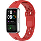 Red perforated watch band fitted to a rectangular smartwatch