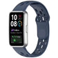 Dark navy perforated TPU watch band fitted to a silver smartwatch