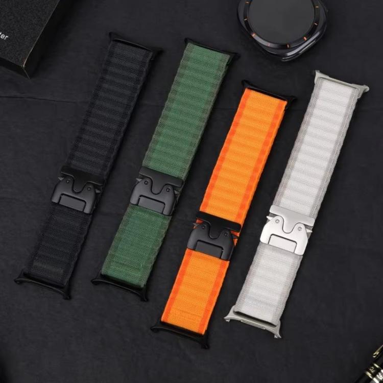 Four rippled nylon watch bands in black, green, orange, and white with buckle clasps