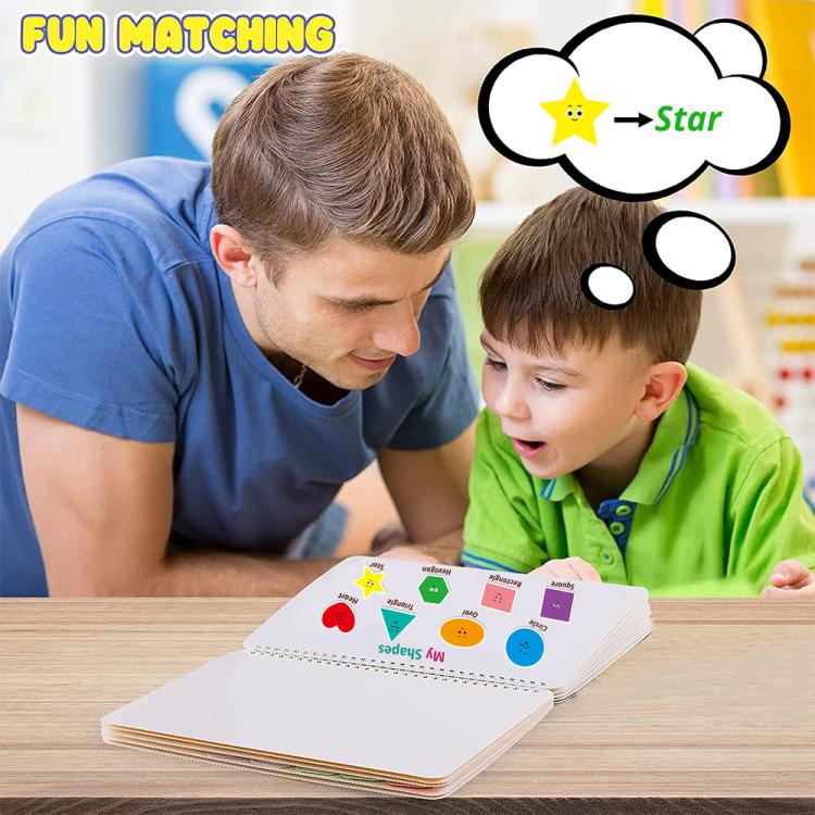 Busy book pages for matching game, with star theme cards on tabletop