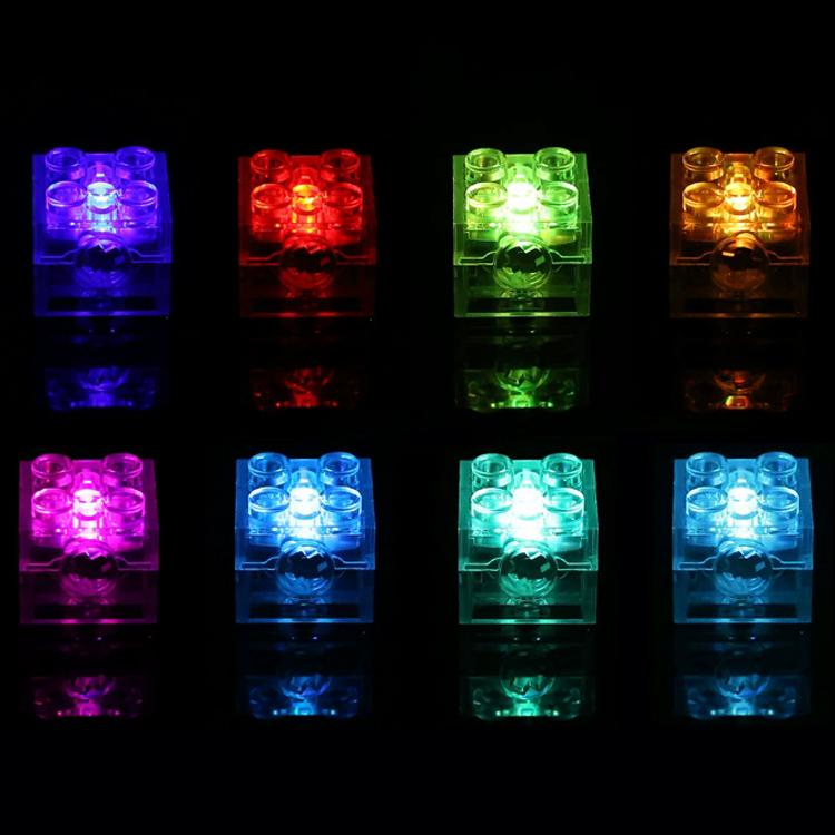 Multi-color LED building-block cubes glowing purple, red, green, and amber