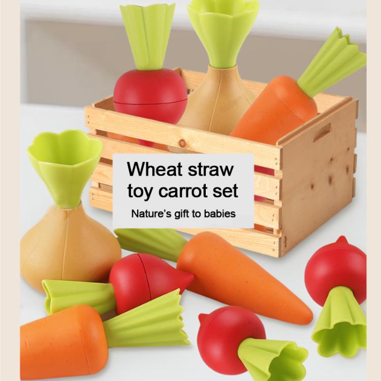 Wheat straw toy carrot set in wooden planter crate with green leafy and orange pieces