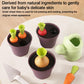 Pretend planter toy set with three purple pots, orange carrots, red radishes, light green watering can